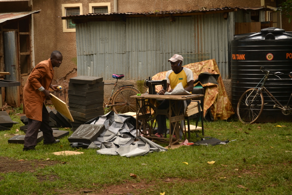 University workers constructing chairs